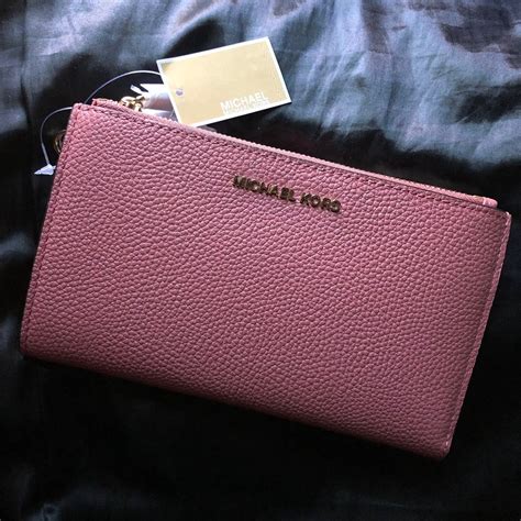 michael kors hamilton wallet pink|Michael Kors pink wristlet wallet.